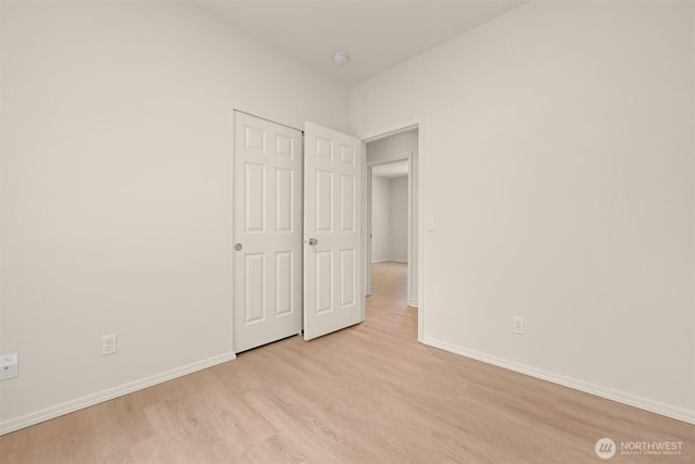 1999 Governor Rd, Bellingham, WA 98229 - unfurnished bedroom with light wood finished floors and baseboards