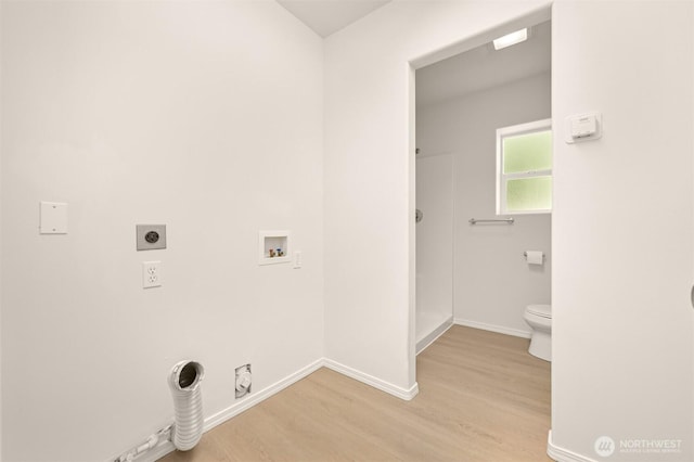 1999 Governor Rd, Bellingham, WA 98229 - laundry area featuring electric dryer hookup, light wood-style flooring, and washer hookup