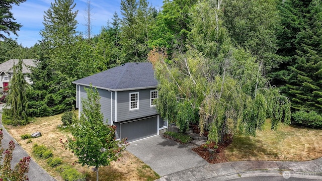 1999 Governor Rd, Bellingham, WA 98229 - view of front facade with driveway, a shingled roof, and an attached garage