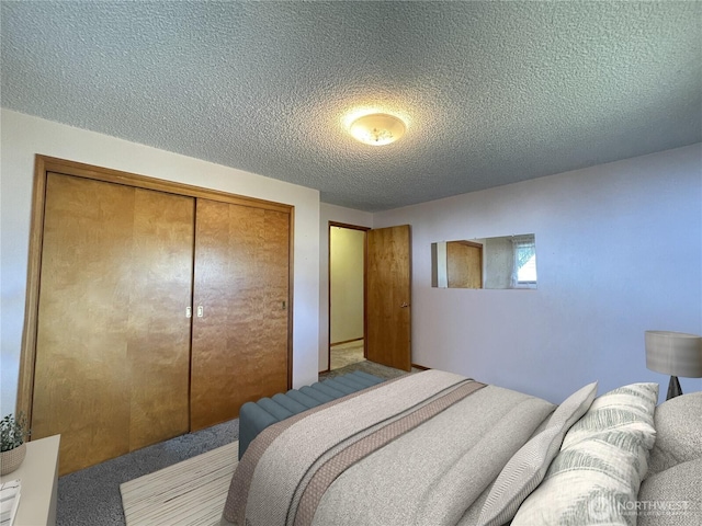 2208 Sandra Ave, Centralia, WA 98531 - carpeted bedroom featuring a textured ceiling and a closet