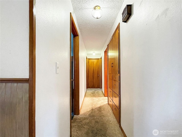 2208 Sandra Ave, Centralia, WA 98531 - corridor with light colored carpet and a textured ceiling