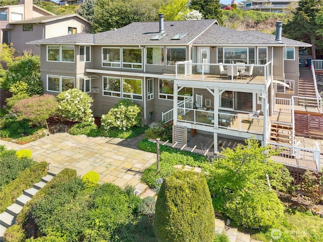 13712 SE 44th St, Bellevue, WA 98006 - back of property featuring stairway, a shingled roof, a patio, and a deck