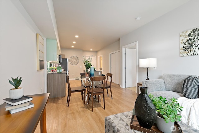 1085 103rd Ave NE Unit 203, Bellevue, WA 98004 - dining space featuring light wood-style flooring and recessed lighting