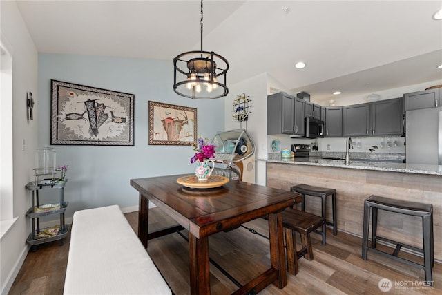 808 W Manson Rd Unit B303, Chelan, WA 98816 - dining room featuring wood finished floors, recessed lighting, a chandelier, and baseboards