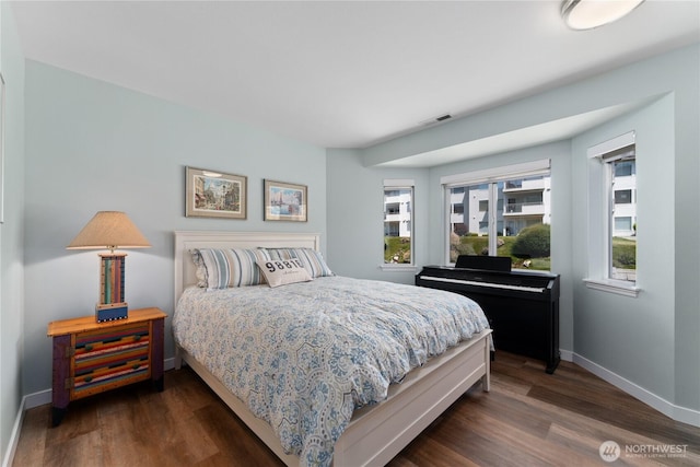 808 W Manson Rd Unit B303, Chelan, WA 98816 - bedroom featuring baseboards and dark wood-style flooring
