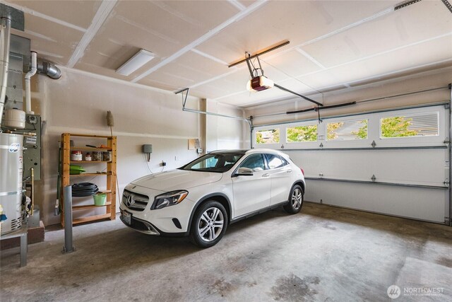 35681 30th Ave S, Federal Way, WA 98003 - garage featuring a garage door opener and water heater