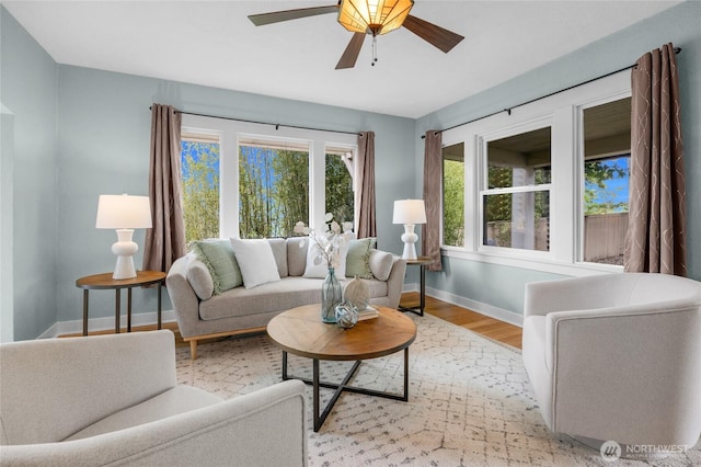 1814 SW 347th Pl, Federal Way, WA 98023 - living room with baseboards, light wood-style flooring, and ceiling fan