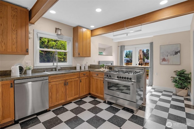 1814 SW 347th Pl, Federal Way, WA 98023 - kitchen featuring stainless steel appliances, light floors, a sink, healthy amount of natural light, and recessed lighting