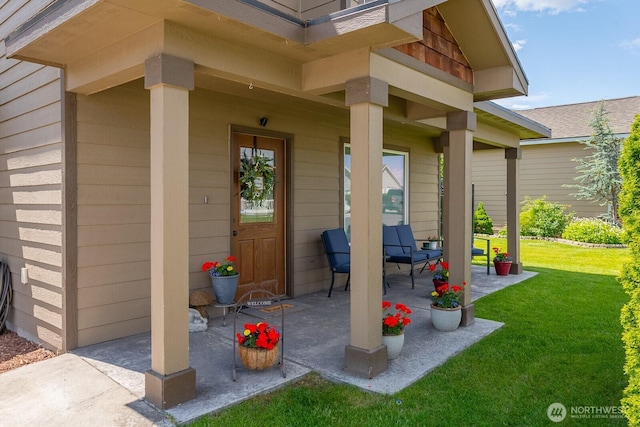 1300 W Marina Dr Unit 1, Moses Lake, WA 98837 - view of exterior entry featuring a yard and a patio