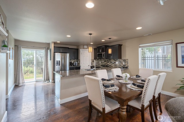1300 W Marina Dr Unit 1, Moses Lake, WA 98837 - dining room with recessed lighting, baseboards, and dark wood-style flooring