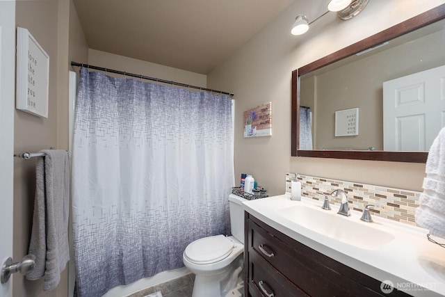 1300 W Marina Dr Unit 1, Moses Lake, WA 98837 - full bath featuring toilet, vanity, backsplash, a shower with curtain, and tile patterned floors