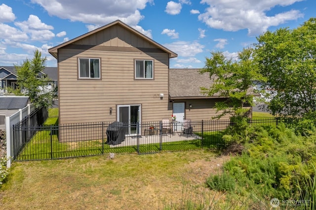 1300 W Marina Dr Unit 1, Moses Lake, WA 98837 - rear view of property featuring a patio area and board and batten siding