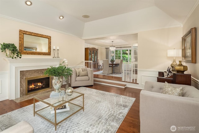 2805 Sahalee Dr E, Sammamish, WA 98074 - living area featuring wood finished floors, a wainscoted wall, a fireplace, crown molding, and recessed lighting