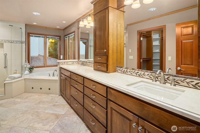 2805 Sahalee Dr E, Sammamish, WA 98074 - bathroom with ornamental molding, double vanity, a garden tub, and recessed lighting
