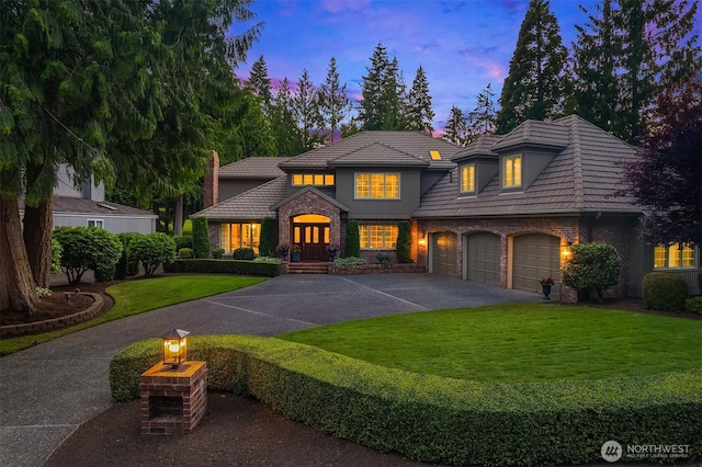 2805 Sahalee Dr E, Sammamish, WA 98074 - view of front facade featuring asphalt driveway, a front lawn, a garage, and a tiled roof