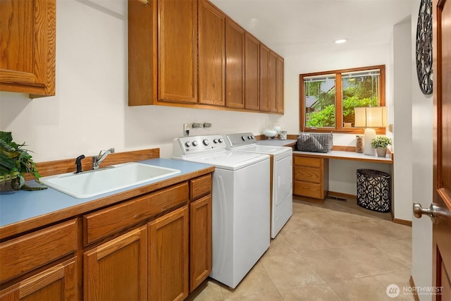2805 Sahalee Dr E, Sammamish, WA 98074 - washroom with cabinet space, washing machine and dryer, light tile patterned flooring, and recessed lighting