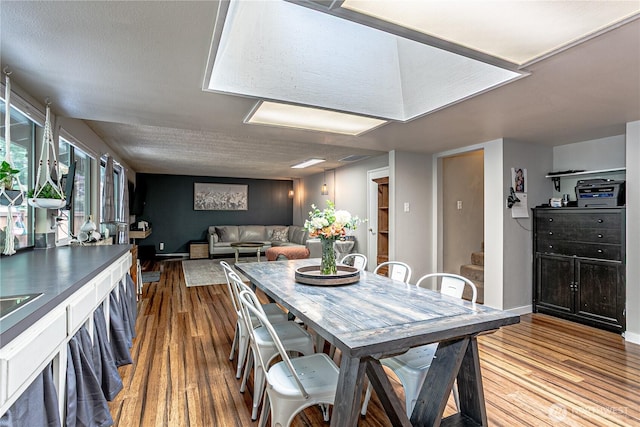5613 89th Ave W, University Place, WA 98467 - dining space featuring wood finished floors and baseboards