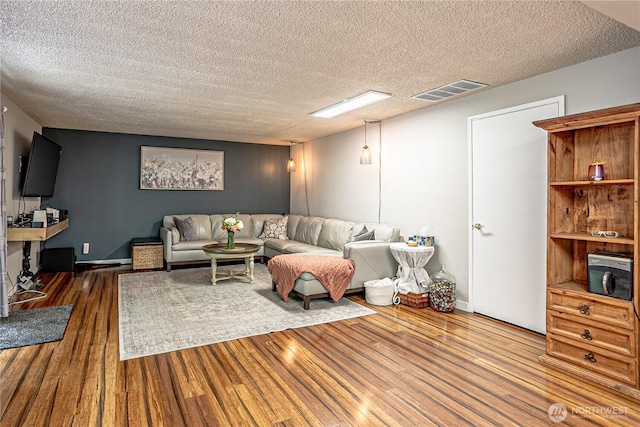 5613 89th Ave W, University Place, WA 98467 - living room with a textured ceiling and wood finished floors