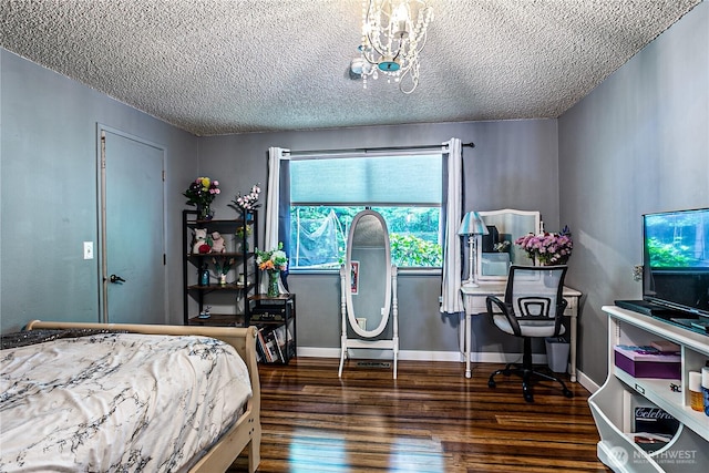 5613 89th Ave W, University Place, WA 98467 - bedroom with a textured ceiling, wood finished floors, baseboards, and a chandelier