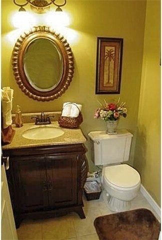 8122 Coquitlam Pl, Blaine, WA 98230 - half bathroom with vanity, tile patterned floors, toilet, and baseboards