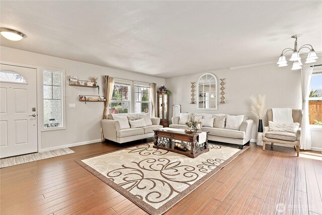 813 SW 363rd Pl, Federal Way, WA 98023 - living area with hardwood / wood-style floors, a chandelier, and baseboards