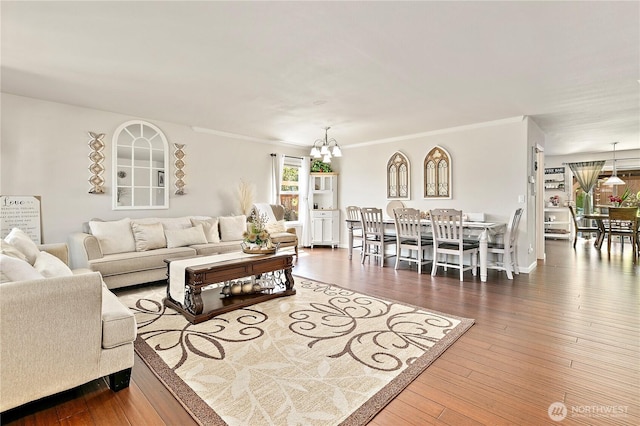 813 SW 363rd Pl, Federal Way, WA 98023 - living room featuring a chandelier, crown molding, and hardwood / wood-style flooring