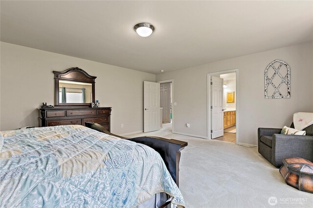 813 SW 363rd Pl, Federal Way, WA 98023 - bedroom with light carpet, baseboards, and ensuite bathroom