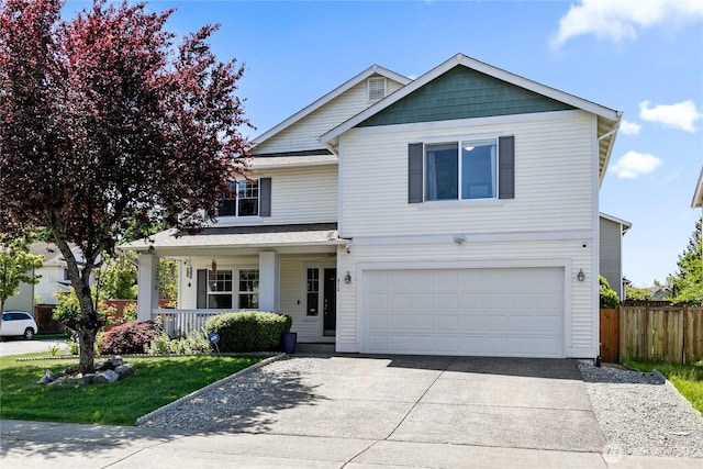 813 SW 363rd Pl, Federal Way, WA 98023 - traditional home featuring an attached garage, concrete driveway, and covered porch