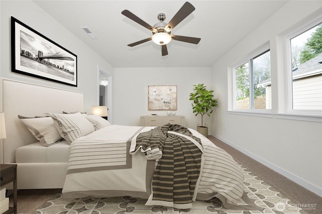 2873 74th Ln SW Unit Lot106, Tumwater, WA 98512 - bedroom with baseboards, carpet, and ceiling fan