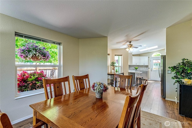 300 Fircrest Dr, Sequim, WA 98382 - dining space with healthy amount of natural light, wood finished floors, a ceiling fan, and baseboards