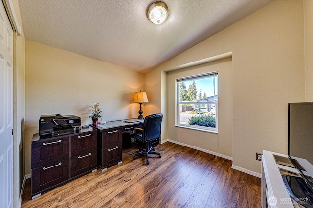 300 Fircrest Dr, Sequim, WA 98382 - office area featuring vaulted ceiling, light wood-type flooring, baseboards, and a textured ceiling