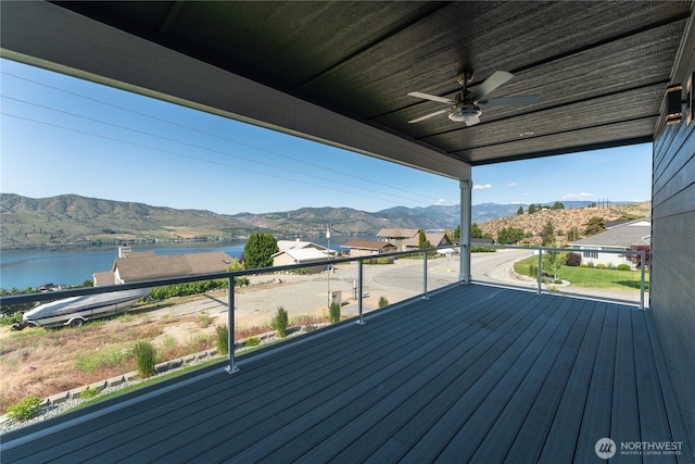 200 Pinnacle Pl, Chelan, WA 98816 - wooden deck featuring a ceiling fan and a water and mountain view