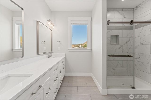 200 Pinnacle Pl, Chelan, WA 98816 - bathroom featuring baseboards, double vanity, and a shower stall