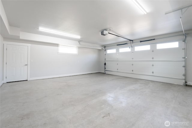 200 Pinnacle Pl, Chelan, WA 98816 - garage featuring a garage door opener and baseboards
