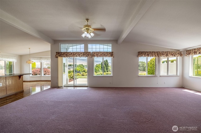 580 Canyon Dr, East Wenatchee, WA 98802 - unfurnished living room featuring a ceiling fan, healthy amount of natural light, and carpet flooring