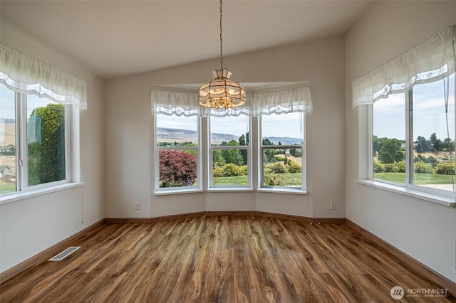 580 Canyon Dr, East Wenatchee, WA 98802 - unfurnished dining area with a chandelier and dark wood-style flooring