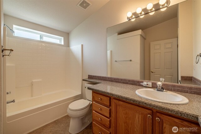 580 Canyon Dr, East Wenatchee, WA 98802 - bathroom with vanity, shower / washtub combination, and vaulted ceiling