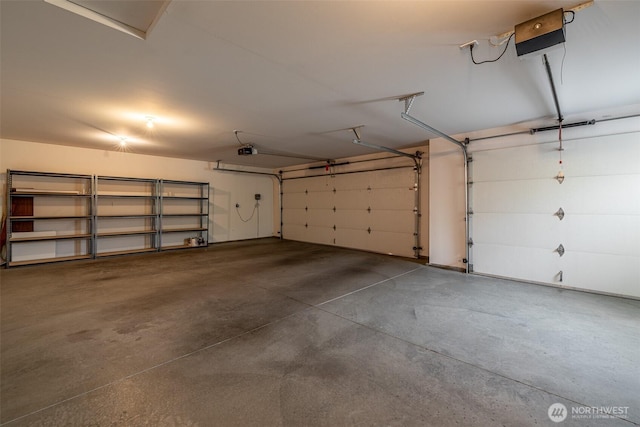 580 Canyon Dr, East Wenatchee, WA 98802 - garage featuring a garage door opener