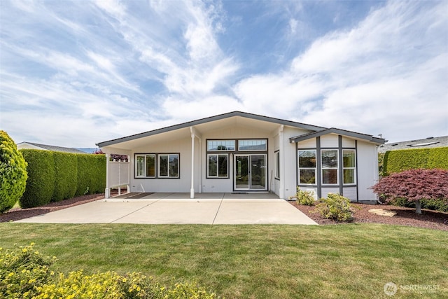 580 Canyon Dr, East Wenatchee, WA 98802 - back of property featuring a patio area and a yard