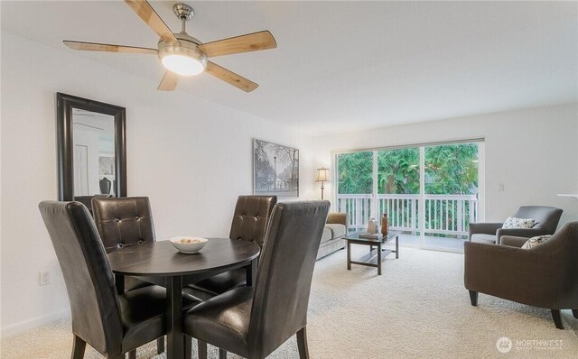 13145 102nd Ln NE Unit 5, Kirkland, WA 98034 - dining room with light colored carpet and ceiling fan