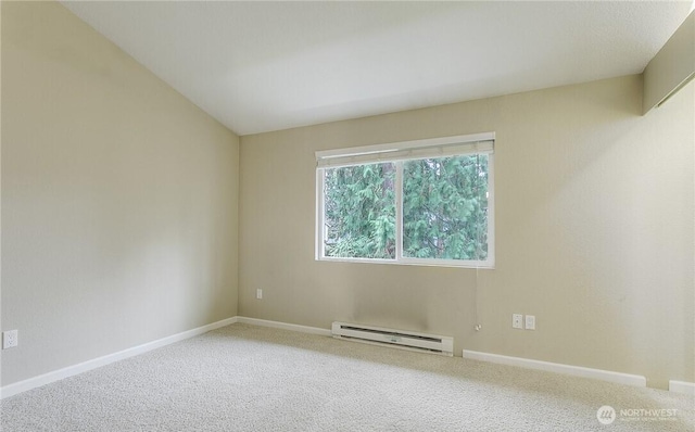 13145 102nd Ln NE Unit 5, Kirkland, WA 98034 - spare room featuring a baseboard radiator, carpet floors, and baseboards