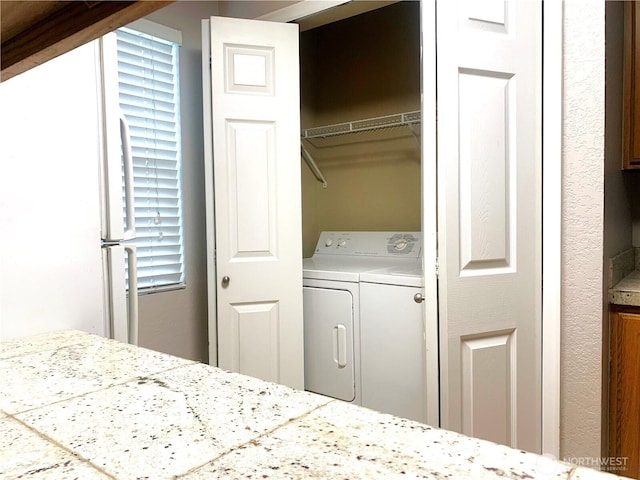 13145 102nd Ln NE Unit 5, Kirkland, WA 98034 - bedroom with washer and dryer and a closet