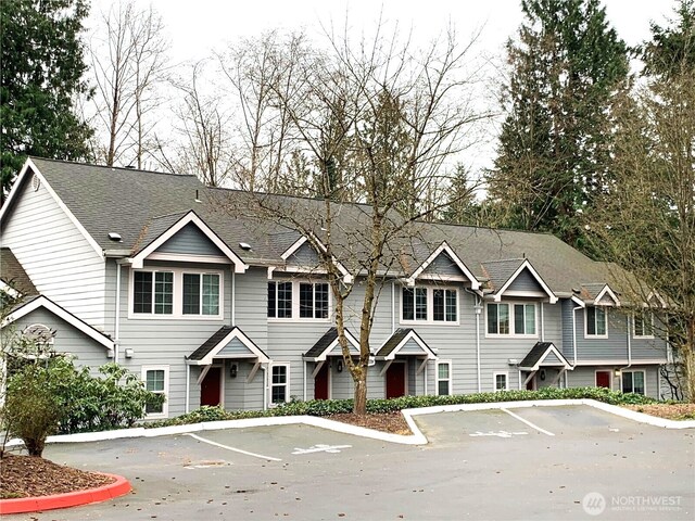 13145 102nd Ln NE Unit 5, Kirkland, WA 98034 - multi unit property featuring uncovered parking and a shingled roof