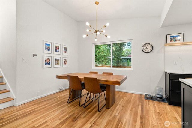 1030 145th Pl SE, Bellevue, WA 98007 - dining space featuring light wood-type flooring, stairway, and a chandelier
