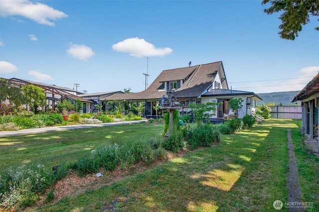 10 E Sunny Sands Rd, Cathlamet, WA 98612 - rear view of property featuring a lawn