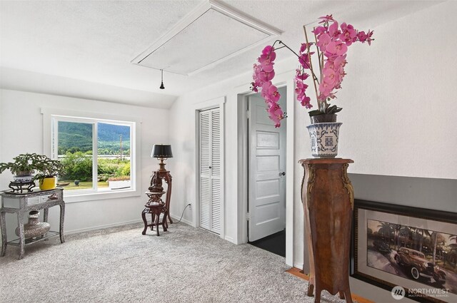 10 E Sunny Sands Rd, Cathlamet, WA 98612 - living area with attic access, carpet floors, and baseboards