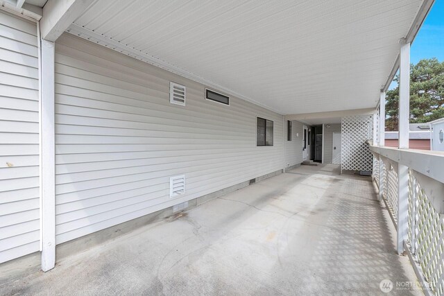 2611 S 288th St Unit 61, Federal Way, WA 98003 - view of patio / terrace with an attached carport