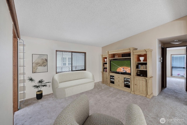 2611 S 288th St Unit 61, Federal Way, WA 98003 - living area with light colored carpet and a textured ceiling