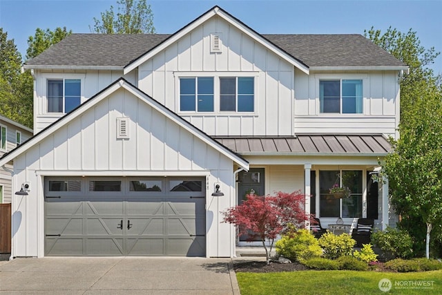 648 S Davis St, Buckley, WA 98321 - view of front facade featuring driveway, roof with shingles, covered porch, an attached garage, and board and batten siding