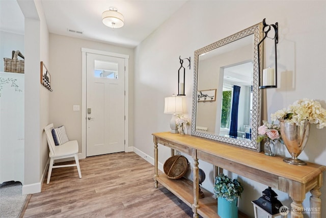 648 S Davis St, Buckley, WA 98321 - entrance foyer with baseboards and wood finished floors